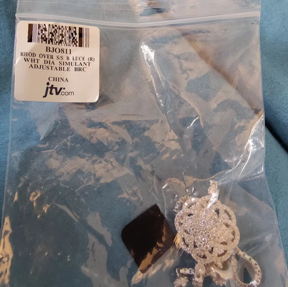 New Bella Luce rhodium over sterling white diamond simulant adjustable bracelet - Picture 8 of 8